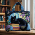 Bolso artesanal gato negro con motivos de libros