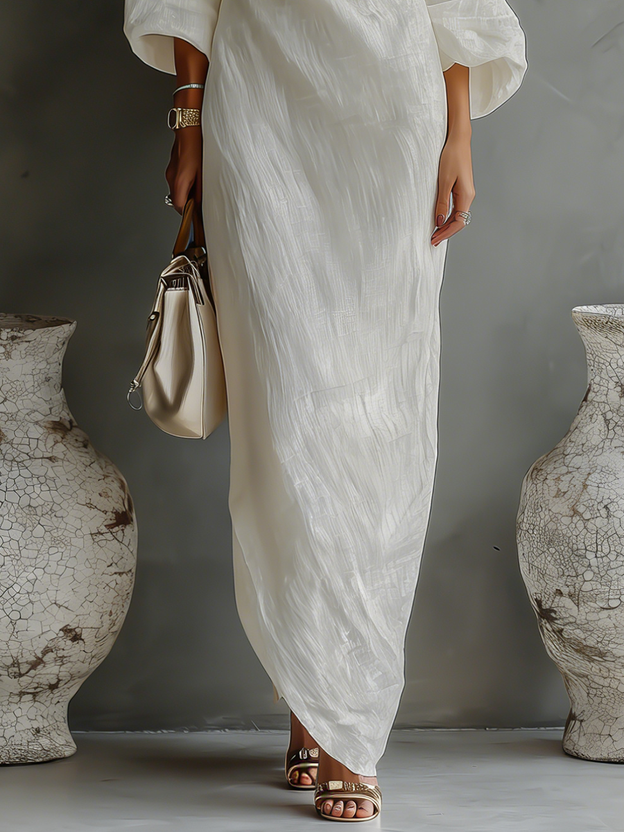 Vestido elegante y vaporoso de algodón y lino en color blanco marfil