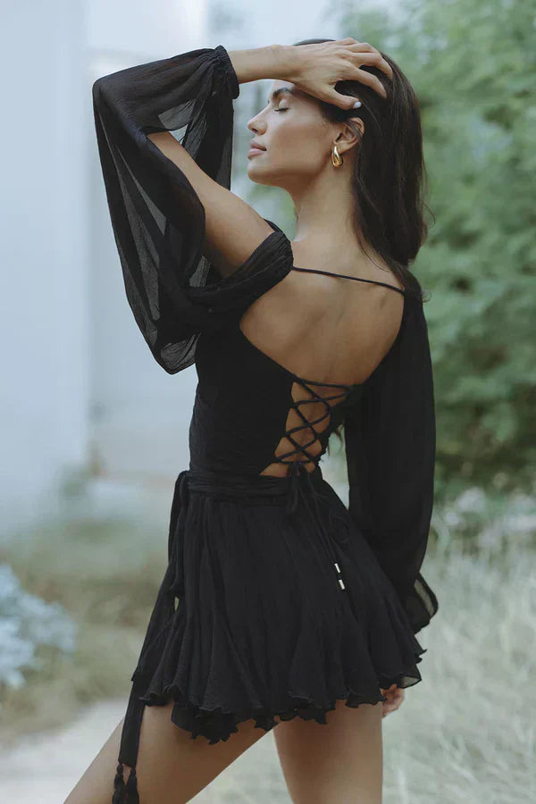 Vestido fluido con mangas de gasa